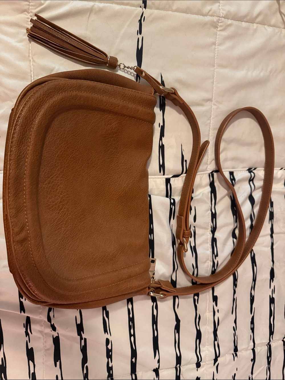 Convertible Tan Leather Crossbody Bag with Tassel Accent